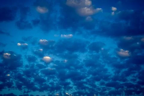Dramatic sunrise sky with vibrant cloud cover over rural Andalusian country.. Stock Photos