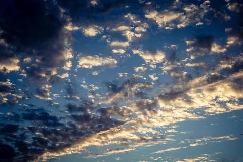 Dramatic sunrise sky with vibrant cloud cover over rural Andalusian country.. Stock Photos