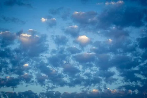 Dramatic sunrise sky with vibrant cloud cover over rural Andalusian country.. Stock Photos