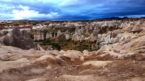 Dramatic Sunrise Storm Clouds Over Love Valley Rock Formations in Cappadocia Stock Footage 346656152