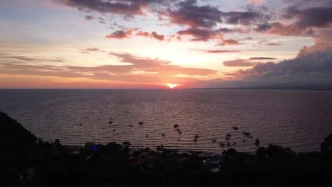 Dramatic sunset aerial Apo Island Philippines ocean horizon tropical landscape 스톡 동영상 332615684