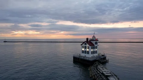 Dramatic sunset and aerial landscape of Lorain harbor light house in the mi.. Stock Footage 322959508