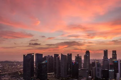 Dramatic sunset and purple  clouds over Singapore Stock Photos