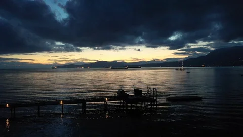 Dramatic Sunset Bay Flyover Aerial Видео 111292107