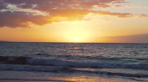 Dramatic Sunset Beach over Ocean Slow Motion Waves Breaking Stock Footage 57768556