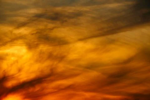 Dramatic sunset - bright red sky with clouds as background, beautiful landsca Stock Photos