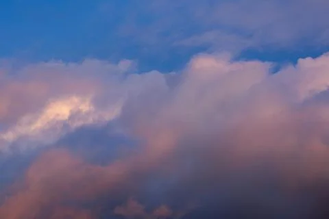Dramatic Sunset Clouds Against Blue Sky Photos
