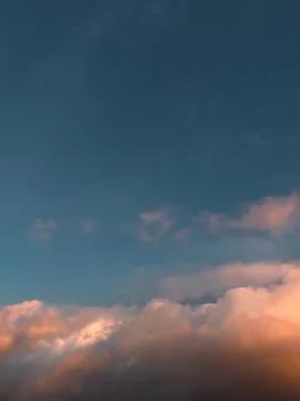 Dramatic Sunset Clouds Against Deep Blue Sky Stock Photos