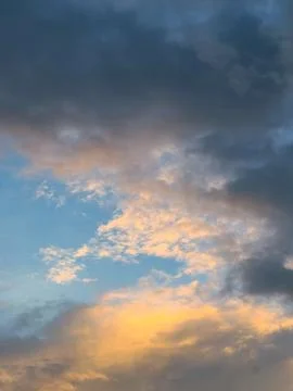 Dramatic Sunset Clouds in a Blue Sky Stock Photos