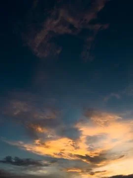 Dramatic Sunset Clouds in a Deep Blue Sky Stock Photos