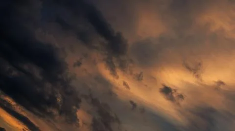 Dramatic Sunset Clouds in Orange and Gray Stock Photos