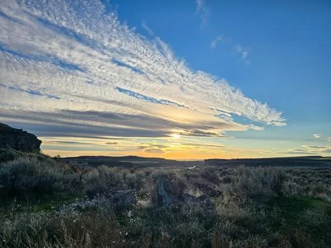 Dramatic Sunset Clouds Over Eastern Washington Landscape Stock Photos
