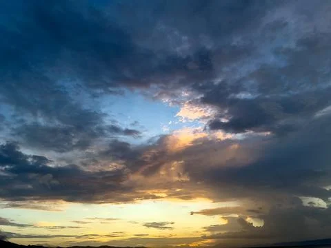 Dramatic Sunset Clouds Over The Horizon Stock Photos