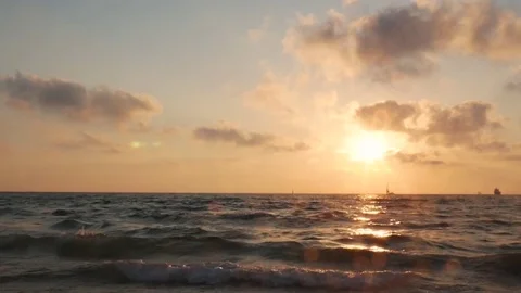 Dramatic sunset with clouds over mediterranean sea, yacht and ship on horizon 스톡 동영상 77483287