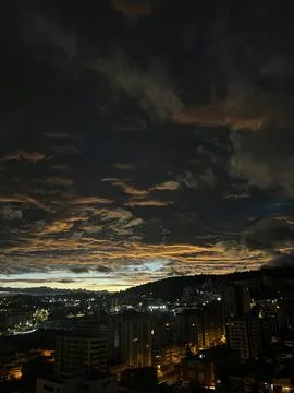 Dramatic Sunset Clouds Over Quito Skyline at Blue Hour, Ecuador Stock Photos