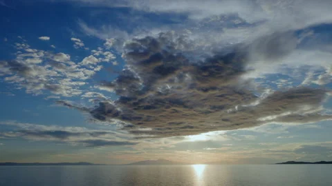 Dramatic sunset with clouds over the sea in Greece Stockbeeldmateriaal 293232259