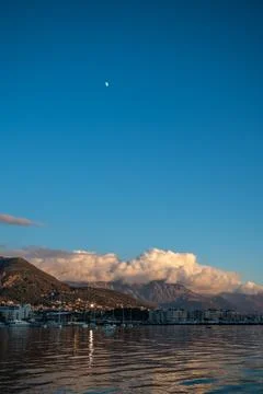 Dramatic sunset clouds over Tivat mountains on Adriatic coast, Montenegro Stock Photos