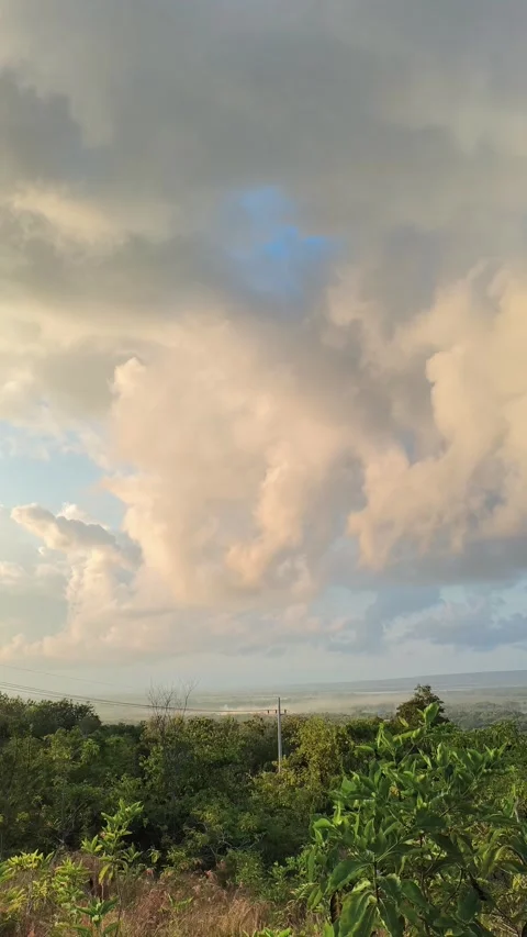 Dramatic Sunset Clouds Over Tropical Hillside - Vertical Stock Footage 340420326