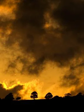 Dramatic sunset with clouds Stock Photos