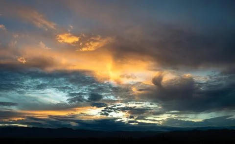 Dramatic sunset with clouds Stock Photos