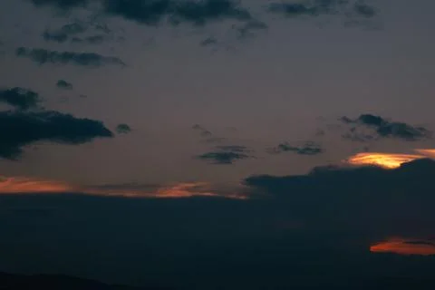 Dramatic Sunset Clouds at Twilight Photos