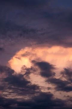 Dramatic Sunset Clouds in Twilight Sky Stock Photos