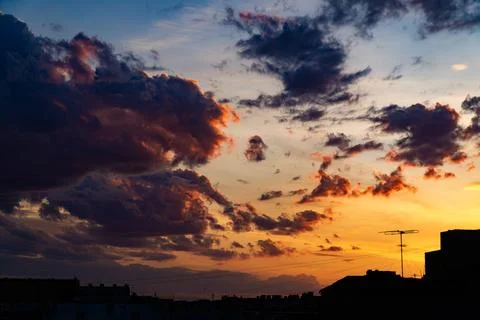 Dramatic Sunset Clouds with Vibrant Colors Stock Photos
