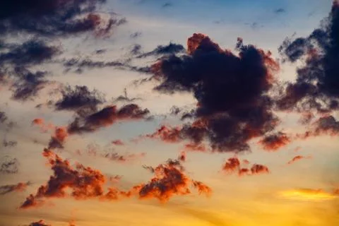 Dramatic Sunset Clouds with Vibrant Colors Stock Photos