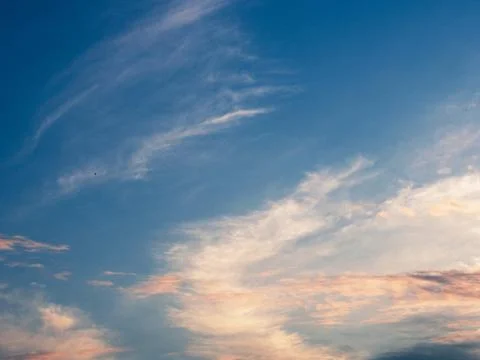 Dramatic sunset. Clouds in wide open sky. Beautiful heaven. Stock Photos
