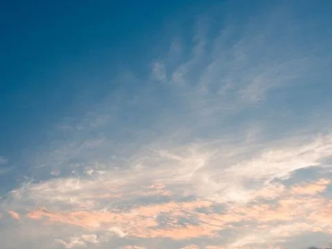 Dramatic sunset. Clouds in wide open sky. Beautiful heaven. Stock Photos
