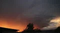 Dramatic sunset colored storm clouds with lightning strike slo-mo 3 HD 동영상