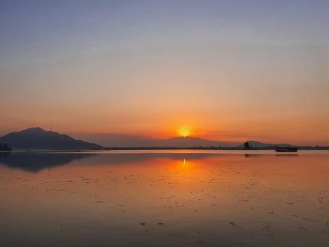 Dramatic sunset at dal lake Stock Photos