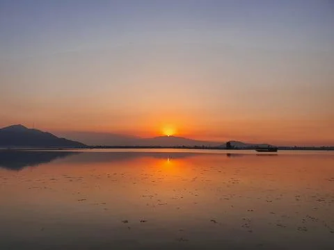 Dramatic sunset at dal lake Stock Photos