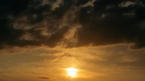 Dramatic Sunset With Dark Clouds 스톡 사진