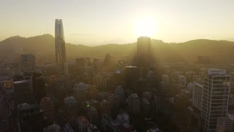 Dramatic sunset drone orbit around Costanera Center skyline Santiago Chile Vídeos de archivo 334683422