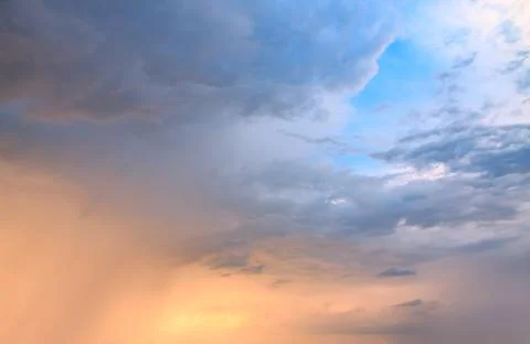Dramatic sunset during the rain Stock Photos
