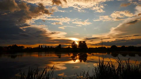 Dramatic sunset like fire in the sky with golden clouds. Stock Footage 137132255