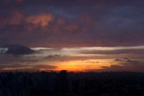 Dramatic sunset like fire in the sky with golden clouds. Fotos Stock