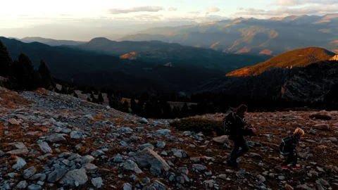 Dramatic sunset hike in the Pyrenees mountains of Spain Stock Footage 303621413