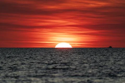 Dramatic sunset on the horizon at Mindil Beach Stock Photos