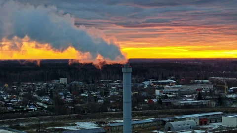 Dramatic Sunset Landscape Aerial Fly Chimney smoke emissions panorama Stock Footage 296738928
