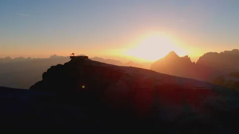 Dramatic sunset light over Dolomites near Piz Boè – aerial view Stock Footage 312271896