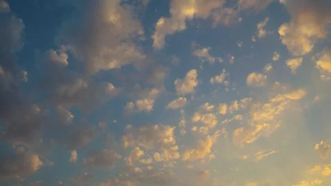 Dramatic sunset orange sky with white cloud patch at dusk Stock Footage 274876728