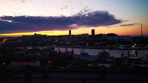 Dramatic sunset over the Bay of Diomedes. Vladivostok, Russia Stock Footage 116248544