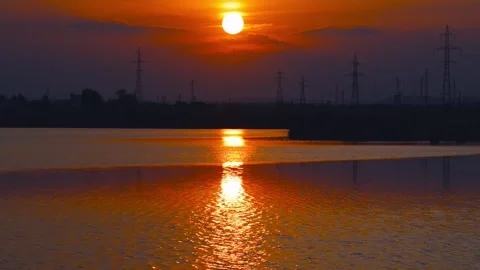 Dramatic sunset over calm lake Stock Footage 136471067