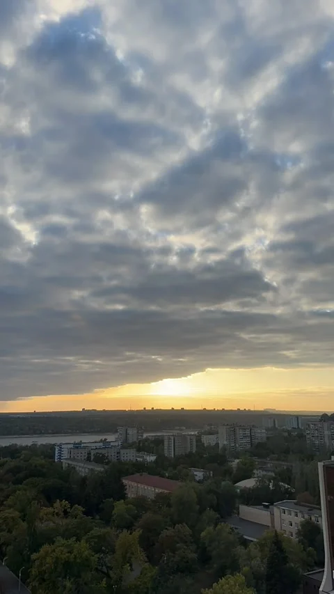 Dramatic Sunset Over the City Skyline Stock Footage 303168104