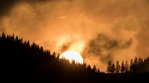 Dramatic sunset over dark forest Time lapse Stock Footage 94712995