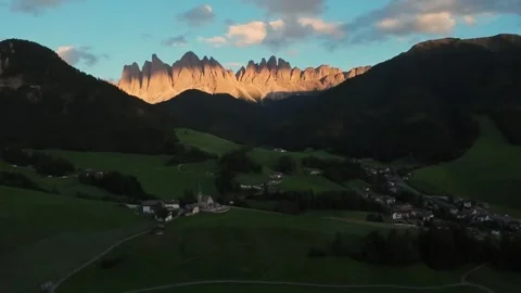 Dramatic Sunset Over Dolomites Valley Twilight, Glowing Serrated Peaks Backlit Stock Footage 325825106