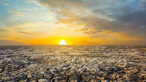 Dramatic sunset over a dry saline land time lapse scene Video stock 297757380