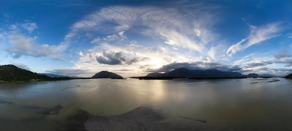 Dramatic Sunset over Fraser River. Nature Landscape Background Panorama Stock Photos